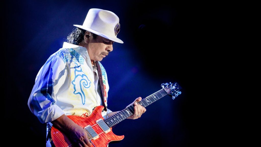 Carlos Santana performing on stage